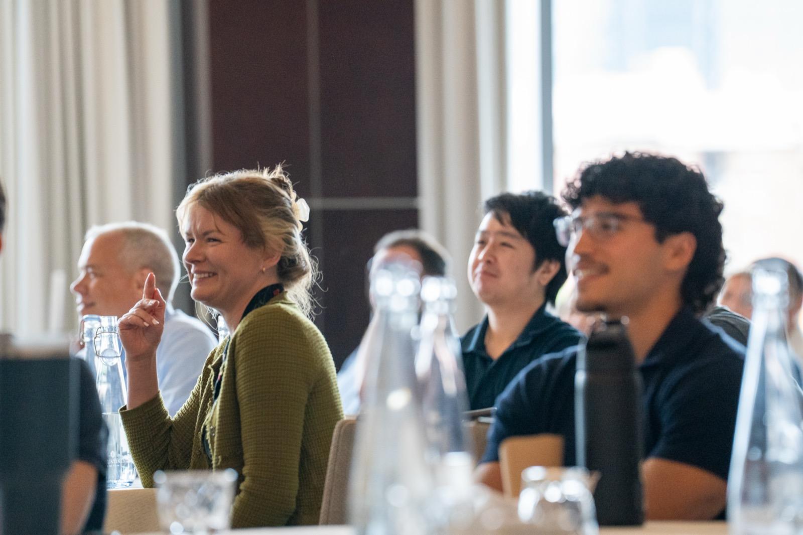 Pixability employees listening at a company meeting