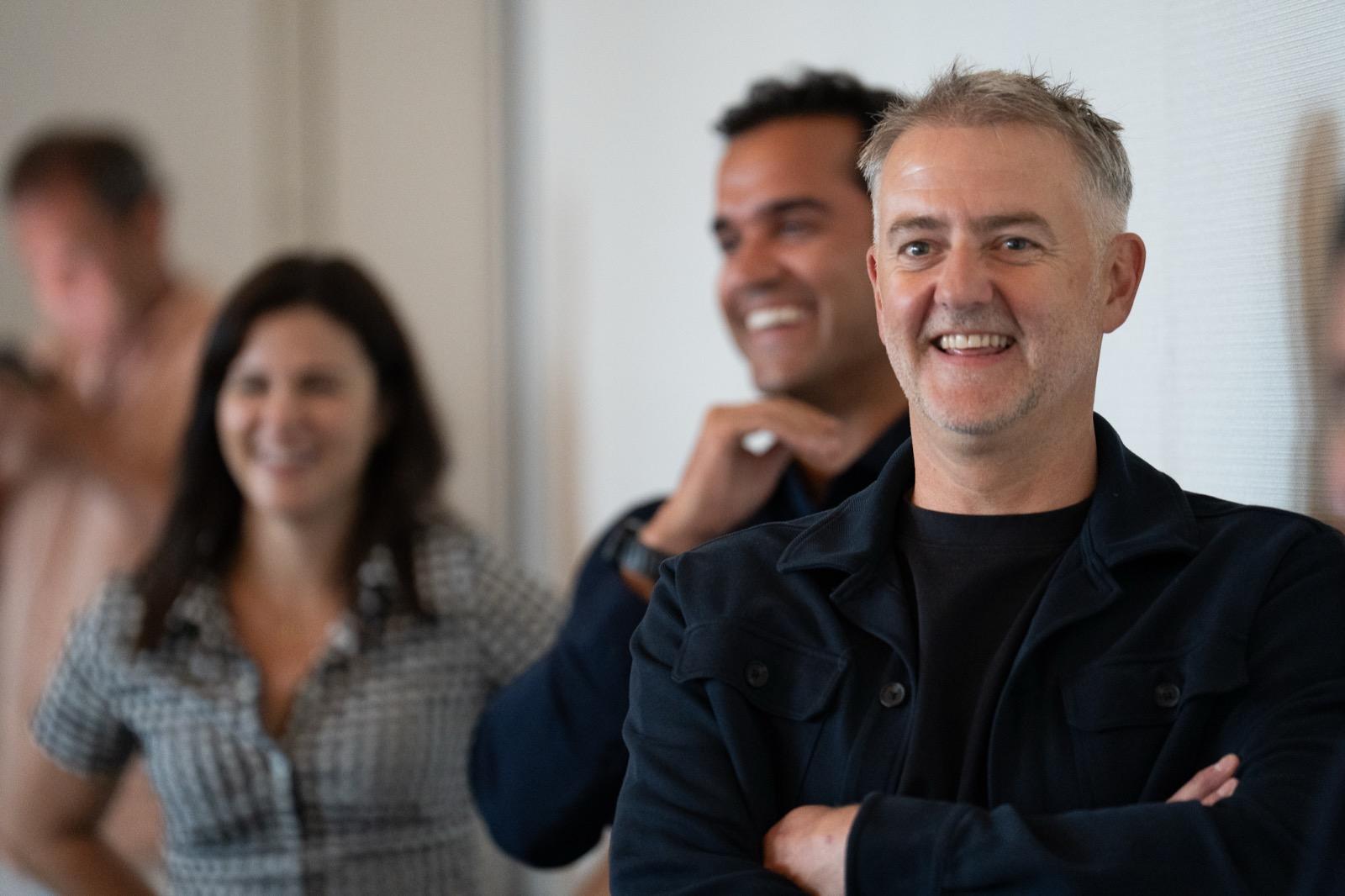 Pixability employees smiling at a company event